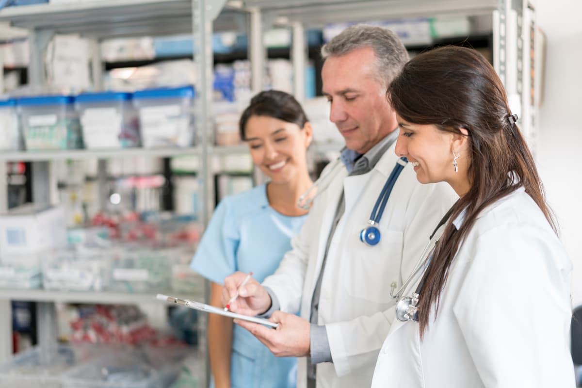 3 Healthcare Professionals Having Discussion