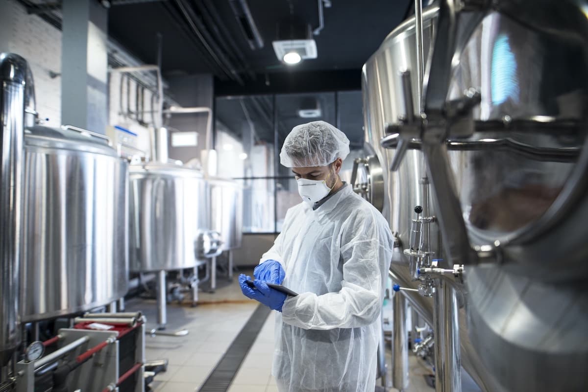 Worker Conducting Facility Checkup