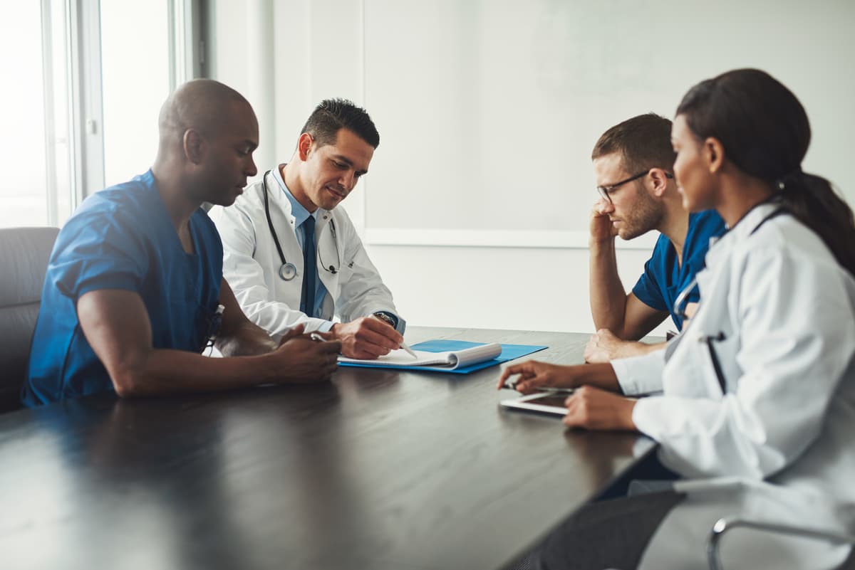 Hospital Staff Discussing Pest Management Options