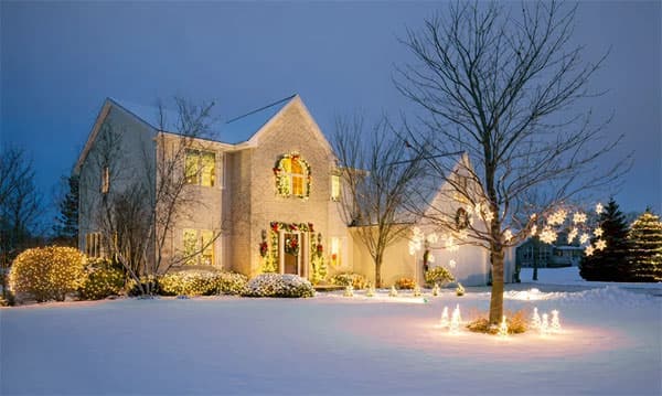 Holiday Home Maintenance - Exterior of a home decorated for the holiday season