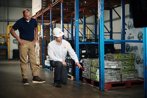 Orkin Commercial Pro performing and inspection in a warehouse